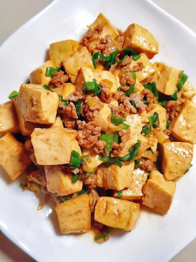 湘菜肉末煎豆腐,鲜香四溢的家乡美味，唤醒味蕾的记忆(湘菜肉末煎豆腐的做法) 湘菜肉末煎豆腐,鲜香四溢的家乡美味，唤醒味蕾的记忆(湘菜肉末煎豆腐的做法) 饮食拾萃